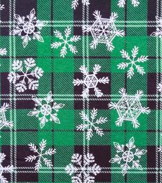 green and black plaid with white snowflakes on it