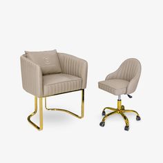 a chair and footstool sitting next to each other on a white surface with a gold base