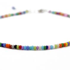 "A tiny rainbow bead anklet. This is such a cute multi color seed bead anklet! The colors include, purple, orange, red, white, green, sky blue, yellow and pink, just to name a few! The beads are made from glass. I hand string these seed beads on beading wire and finish them with a sterling silver lobster clasp and small length of sterling silver chain. This anklet has a 1\" sterling silver chain extension. The length on the listing is the total length measured end to end including the extension. Casual Multicolor Beaded Anklets, Casual Multicolor Tiny Beads Anklets, Casual Multicolor Round Beads Anklets, Casual Multicolor Anklets With Tiny Beads, Multicolor Round Beads Anklets As Gift, Multicolor Round Beads Anklets For Gift, Gift Multicolor Round Bead Anklets, Gift Multicolor Round Beads Anklets, Seed Bead Anklet