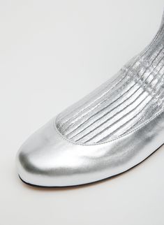 First introduced on our Spring 2024 Runway, the Borg Sock Boot receives a refresh for the turnover of seasons. Now available in two metallic colorways, our newest iteration will be the style you reach for, dialing up or toning down your look, depending on the desired vibe this Winter season. 100% Lamb Leather (Upper), 100% Cotton (Sock), 100% Cuoio Leather (Outsole) Style Number: SW24BO2118 Available in: Gold, Silver Metallic Socks, Silver Metallic Shoes, The Borg, 2024 Runway, Sock Boot, Metallic Shoes, Silver Shoes, Shoes Outlet, Spring 2024