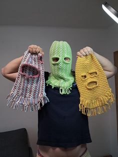 I am selling a set of masks in different colors. These balaclavas are handmade from thick and natural threads. These threads are pleasant to the skin and do not cause any irritation. The masks are warm, so these hats are not very comfortable to wear in the heat.  But in winter, such hats will be a real salvation from the cold, because they are easy to put on and take off, protect the whole head and neck.  The first mask is green in color. It is unisex. It has two holes for two eyes. The mouth an Motorcycle Mask, Two Ponytails, Warm Hats, Knitted Balaclava, Green Yellow Blue, Long Hair Girl, Head And Neck, Full Face, Look Cool