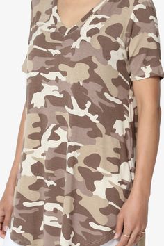 This camo-printed top is a surprisingly versatile piece you'll want to wear with everything. Add a touch of trend-right camo to your off-duty wardrobe with this soft, comfy jersey tee. Tuck in to denim or leather pants, versatile cool-girl silhouette that go from day to night with ease.V-Neck, Short SleevesCurved hem, Extended length for cover your hipLightweight soft & comfy stretchy jersey knit fabricSize Guide : Fits true to US size, take your normal sizeModel size : 5'3" height, 34" bust, 24 Summer Military Camouflage Tops, Summer Military Style Camouflage Tops, Military Style Camouflage Tops For Summer, Spring Casual Camouflage T-shirt, Casual Camouflage T-shirt For Spring, Casual Camouflage Tops For Spring, Khaki Military Style Summer Top, Military Style Khaki Top For Summer, Trendy Camouflage T-shirt For Summer