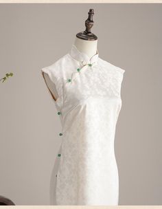 This is a sleeveless cheongsam in green color. The dress length is about 122cm, and it features a zipper at the back. Size Chart: S: Shoulder width-35cm, Chest-83cm, Waist-66cm, Hip-86cm M: Shoulder width-36cm, Chest-87cm, Waist-70cm, Hip-90cm L: Shoulder width-37cm, Chest-91cm, Waist-74cm, Hip-94cm XL: Shoulder width-38cm, Chest-95cm, Waist-78cm, Hip-98cm 2XL: Shoulder width-39cm, Chest-99cm, Waist-82cm, Hip-102cm 3XL: Shoulder width-40cm, Chest-102cm, Waist-86cm, Hip-106cm Please gently hand w Summer White Cheongsam With Stand Collar, Traditional White Cheongsam With Stand Collar, White Summer Cheongsam With Stand Collar, Fitted Embroidered White Cheongsam, Traditional White Summer Cheongsam, Chinese Qipao, New Chinese Style, New Chinese, Engagement Dresses