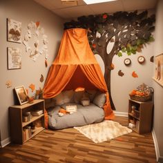 an orange canopy bed in a child's room