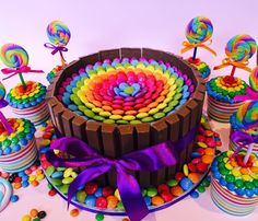 a chocolate cake decorated with multicolored icing