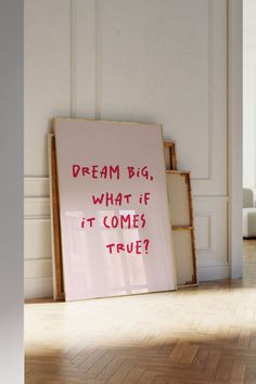 a sign that says dream big, what if it comes true? on the floor