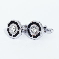 Pair of men's cufflinks made of steel with decorations in black enamel and central crystal. The crystal is worked at 30% lead so very bright. Article handcrafted in Italy not replicable. Art Wrapping Design. Measure cm.1,5 x 1,5 Title: Hexagon Material: Steel, Enamel, Crystal Luxury Modern Cufflinks With Polished Finish, Hexagon Cufflinks, Luxury Adjustable Classic Cufflinks, Luxury Elegant Adjustable Cufflinks, Luxury Black Polished Finish Cufflinks, Tie Tack, Cufflinks Men, Tie Accessories, Black Enamel