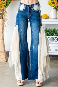 These mid-rise Oli & Hali jeans feature a zip fly and button closure, five functional pockets, exposed seam details throughout, and flare legs with big lace details along the sides of the legs. These do have stretch to them.    Materials: 75% Cotton 23% Polyester 2% Spandex (contrast 1) 100% Polyester (Contrast 2) 55% Cotton 45% Polyester Plus Size Lace Jeans, Cool Denim Jeans, Jeans With Side Panels, Jeans With Lace Bottoms, Diy Wide Leg Pants, Diy Lace Jeans, Creative Pants, Christmas Jeans, Rework Clothes