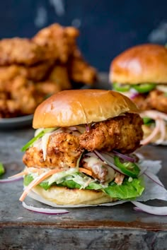 chicken burgers with honey mustard coleslaw on a bun and lettuce