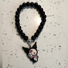 Sanrio Kuromi Cute & Creepy Handcrafted Black Beaded Bracelet - With Silver Accent, Kuromi Charm And Stretch Handmade Black Charm Bracelet With Round Beads, Black Beaded Bracelet, Cute Creepy, Black Beaded Bracelets, Sanrio Kuromi, Silver Accents, Black Beads, Bead Bracelet, Womens Jewelry Bracelets