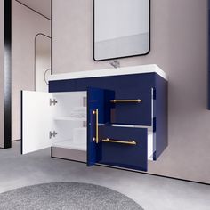 a blue and white cabinet with gold handles next to a mirror on the wall in a room