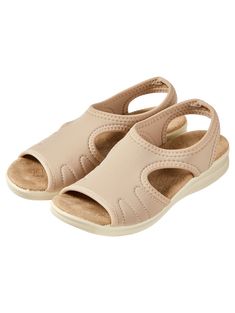 Treat your feet to stretch-to-fit comfort! These casual sandals are crafted with stretch Lycra, so when you slip them on, they form to your feet for a custom fit. No more worries about accommodating various foot issues! They're made in Italy and are well-crafted for heel-to-toe comfort and a touch of style. Easy slingback style Supportive microfiber anatomic insole Slip-proof, antishock, flexible polyurethane outsole Stretch lycra construction with stitching detailing Spot clean 1-1/2" heel Made in Italy | Women's Slingback Stretch Sandal - Beige - 35 - The Vermont Country Store Comfortable Round Toe Slingback Sandals, Comfortable Non-slip Slip-on Sandals, Comfortable Beige Slip-on Sandals, Comfortable Sport Sandals With Ortholite Insole And Slip-on Design, Comfortable Open Toe Sport Sandals With Arch Support, Comfortable Cushioned Slip-on Sandals, Comfortable Slip-resistant Sandals With Round Toe, Beige Comfortable Slingback Sandals With Cushioned Footbed, Comfortable Slip-on Slingback Sandals