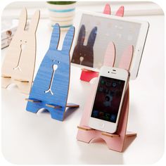 an image of a cell phone holder with bunny silhouettes on it and text that reads $ 19 99