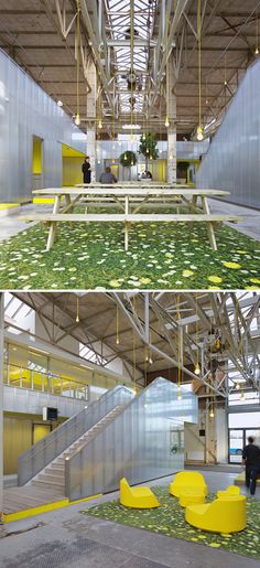 the inside of an office building with yellow chairs and green carpet on the floor, and stairs leading up to the second floor