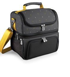 a black and yellow lunch bag on a white background with gold trim around the handles