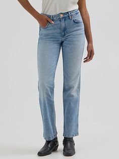 This bold take on our iconic bootcut offers everything the modern cowgirl could want, including a mid-rise waist, a fitted silhouette through the seat, a straight leg through the knee, as well as a perfectly flared leg opening your boots will love. It comes fully loaded with all the Wrangler® icons you know and want: the five-pocket styling, the “W” embroidery, a logo patch, and branded hardware to round out the look. Trust us, these jeans were made for walking. Western Style Relaxed Fit Straight Leg Bottoms, Medium Wash Flare Jeans For Rodeo In Fall, Western Style Straight Leg Relaxed Fit Bottoms, Western Style Straight Leg Bottoms With Relaxed Fit, High Rise Jeans For Fall Rodeo, High-rise Jeans For Rodeo In Fall, High Rise Jeans For Rodeo In Fall, Western Style Relaxed Fit Straight Leg Jeans, Western Style Straight Leg Jeans For Spring