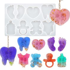 an assortment of different shaped cookie cutters in the shape of heart and bear shapes