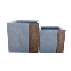 two square planters sitting next to each other