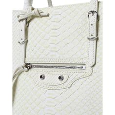 Size Country Unit: One Size. Made of 100% Pythonskin Leather. Color: White. Dual rolled slim handles. Front zip pocket. Silver-tone hardware. Classic studs and buckle details. Balenciaga logo details on the front. Made in Italy. Dimensions: 31cm x 41.5cm x 18cm. Material: 100% Pythonskin Leather. Luxury Bags With Silver-tone Hardware, Luxury White Bags With Silver-tone Hardware, Yellow Balenciaga, Balenciaga Tote Bag, Balenciaga Tote, Python Skin, Balenciaga Logo, Lemon Yellow, Leather Tote Bag