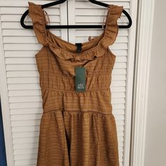 Cute And Fun Sun Dress. Cinched Waist And A Flowy Skirt With An Asymmetrical Hem. New With Tags, Never Worn Fitted Ruffle Midi Dress, Casual Style, Fitted Midi-length Ruffle Dress Casual, Fitted Casual Ruffle Midi Dress, Casual Midi Dress With Ruffled Straps, Fitted Casual Midi-length Ruffle Dress, Brown Summer Dress With Ruffles, Brown Ruffled Summer Dress, Summer Mini Pleated Ruffle Dress, Casual Cotton Mini Dress With Ruffled Straps