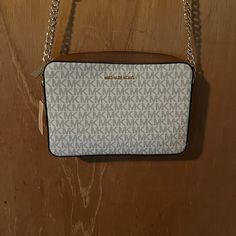 Brand New Adjustable Strap Handbag. It Can Be Adjusted Too A Cross Body Purse. Michael Kors Tan Rectangular Bag, Michael Kors Tan Bag With Adjustable Strap, Michael Kors Tan Crossbody Bag, Michael Kors Sling Bag, Michael Kors Handbags Black, Light Brown Color, Pink Crossbody Bag, Grey Bag, Michael Kors Crossbody Bag