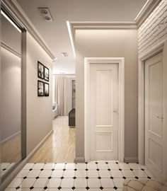 an empty hallway with white walls and black and white flooring, framed pictures on the wall