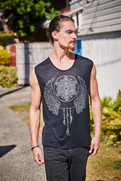 Men boho singlet, with a geometric print on the front, designed by a talented team of artists. This is a very comfortable and funky psytrance tank top. Great at festivals like Burning Man! 🔆Thank you for taking the time to visit our products! To find more men's tops, just follow the link  https://etsy.me/3RTneHr  Dear customers,  please note all items are hand dyed using natural products and slight shades of colour variations are part of this process. 🔆SIZE: Please refer to our size chart for Cotton Tank Top With Graphic Print For Festivals, Cotton Graphic Print Tank Top For Festivals, Casual Printed Festival Tank Top, Casual Printed Tank Top For Festivals, Festival Graphic Print Tank Tops, Graphic Print Tank Tops For Festivals, Sleeveless Printed Tops For Festivals, Bohemian Sleeveless Yoga Top, Bohemian Sleeveless Festival Tank Top