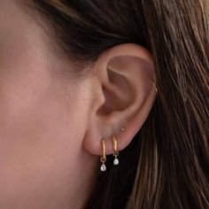 Adorn your everyday earrings with a touch of sparkle. Add our tiny charms to get even more out of your staple hoops. 14K Gold Moissanite DOES NOT FIT ALL EARRINGS, shop all matching earrings / singles Jumpring Inner Diameter 2.2mm Pear 5x3mm #CS056 tiny-pear-gemstone-earring-charm-moissanite-14k-gold tiny-pear-gemstone-earring-charm-opal-14k-gold Everyday White Teardrop Huggie Earrings, Everyday Teardrop Huggie Earrings With Pearl Drop, Dainty Everyday Pearl Drop Huggie Earrings, Minimalist Teardrop Huggie Earrings For Anniversary, Dainty 14k Gold Dangle Huggie Earrings, Dainty Everyday Diamond Earrings, Dainty Teardrop Huggie Earrings For Everyday, Dainty Teardrop Hoop Earrings Tarnish Resistant, 14k Gold Dangle Huggie Earrings For Everyday