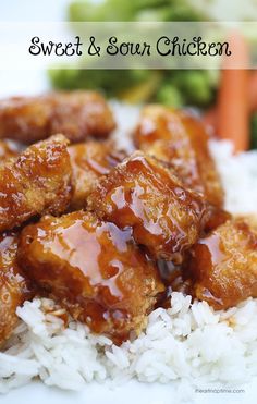 sweet and sour chicken on rice with broccoli in the background