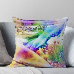 an abstract painting on the back of a pillow