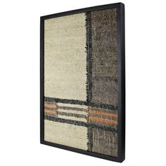 a wall hanging with a multicolored rug on the front and back of it