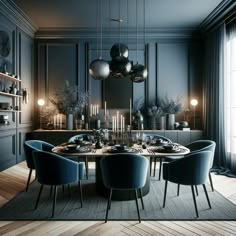 an elegant dining room with blue chairs and black walls