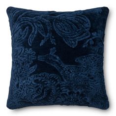 a blue pillow with an intricate design on it