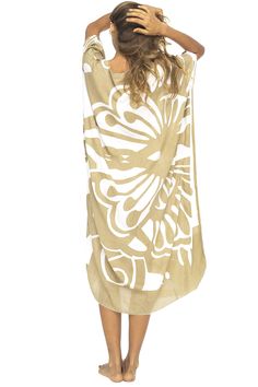 When lounging comfort is on your mind you will love the ease of this long, loose caftan. This poncho-style cover up features an oversized swirling Batik pattern that is tropical and bold. This handmade caftan is designed to be soft and lightweight with an unstructured cut that flatters a variety of body types. The flowing three-quarter length butterfly sleeves mirror the casual mid-calf hemline draping beautifully over every curve. BEAUTIFUL BOHO KAFTAN MAXI DRESS. This gorgeous long beach dress in an artisan black butterfly print is the perfect bathing suit cover up or summer loungewear. Exclusive design SEXY V-NECK with elbow length sleeves. Lightweight and slightly sheer, you’ll stay cool and comfortable in this flowy beach tunic. Loose, generous cut fits regular to plus sizes 100% RAYO Summer White Floral Print Cover-up, White Floral Print Summer Cover-up, Beach Flowy Beige Cover-up, Flowy Beige Cover-up For The Beach, Beige Flowy Beach Cover-up, Flowy Beige Beach Cover-up, White Printed Poolside Dress, White Floral Print Cover-up For Beach Season, Beige Sarong For Summer Beach