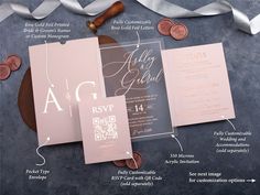 the wedding stationery is displayed on top of a table with coins and ribbons around it