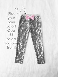 "PANTS: Designed by us with specific length and used premium soft fabric ( %95 cotton %5 spandex) back and behind the sequin fabric to eliminate itchiness~ ONLY front has sequin, back of pants are made with matching soft cotton. Embellished with sequin bow ( made with brooch pin for easy wash! NOT GLUED on short! ) You can chose and color bow with these GOLD pants AVAILABLE SIZES: 0-6 months 6-12 months 12 months-3T 3T- 5T 6Y-8Y 8Y-10Y PROCESSING TIME: Even though we ship 1-3 business days, proc Spring Sequin Stretch Bottoms, Spring Sequined Stretch Bottoms, Spring Stretch Sequin Bottoms, Silver Stretch Bottoms For Spring, Trendy Stretch Pants With Sequins, Spring Silver Sequined Bottoms, Trendy Fitted Silver Bottoms, Trendy Silver Fitted Bottoms, Trendy Stretch Silver Bottoms