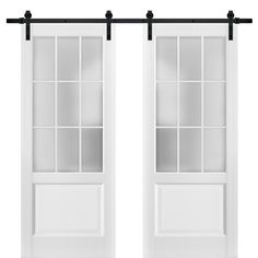 two white doors with black hardware on each side