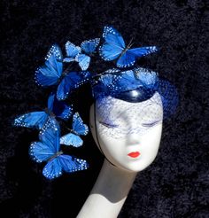 "A dramatic feather butterfly fascinator hat perfect for all sorts of special occasions, derby, ascot, and races. Made to order, you can choose your colors. This headpiece features hand-cut and hand-placed butterfly wings made out of feathers. Disguised into the pattern are small hearts. There is also a dramatic wired, face-framing \"arm\" that is adjustable and allows you to customize your look. The butterflies are individually wired to this arm. Also attached is a matching veil. One side is se Butterfly Fascinator, Couture Fascinators, Feather Butterfly, Feather Painting, Cocktail Hat, Fascinator Hat, Pillbox Hat, Fascinator Hats, Pill Boxes