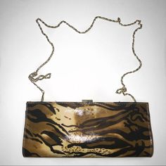 Trendy Bracino Tiger Clutch/Purse With Gold Chain -Nwt Can Be Used As A Clutch Or Purse! 2 In 1 Bag Tiger Print Nwt- Non Smoking Home Measurements Are Length-11” Side-4.2” Length Of Chain-46” Leopard Print Rectangular Shoulder Bag With Gold-tone Hardware, Leopard Print Bags With Gold-tone Hardware For Shopping, Leopard Print Satchel Shoulder Bag With Gold-tone Hardware, Leather Clutch With Crocodile Pattern, Rectangular, Printed Clutch, Luxury Leopard Print Shoulder Bag With Gold-tone Hardware, Tiger Print, Purse, Clutch Purse