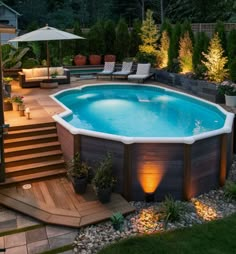 an above ground pool with steps leading up to it and lights on the deck area