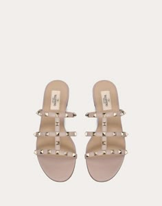 Valentino Garavani Rockstud flat sandal in calfskin leather. - Platinum-finish studs - Heel height 5 mm/0.25'' - Made in Italy Designer Studded Flats, Luxury Studded Sandals For Spring, Designer Open Heel Sandals With Studs, Studded Flat Heel Sandals, Designer Studded Flat Sandals, Akito Sohma, Valentino Flat Sandals, Valentino Slides, Valentino Rockstud Sandals