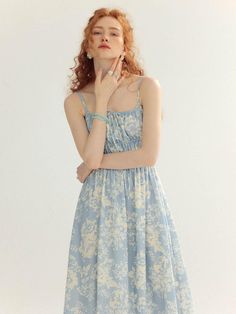 This is a romantic and feminine dress by Sincethen that is made out of high quality and sturdy material. With distinctive mood of the design and comfortable wear, you can style it for your casual daily outfit.- Natural shirring detail overall- Adjustable shoulder straps- Romantic and feminine mood Ruched Sundress With Ruffled Straps For Daywear, Spring Ruched Sundress For Daywear, Casual Cotton Midi Dress With Ruffled Straps, Casual Midi Dress With Adjustable Straps For Garden Party, Feminine Smock Midi Dress For Summer, Spring Smock Dresses With Spaghetti Straps, Spring Dresses With Smock And Spaghetti Straps, Feminine Summer Midi Dress With Smock Details, Feminine Summer Midi Dress With Smock