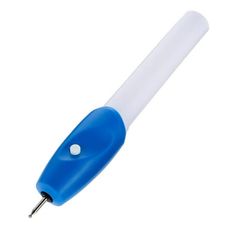 a blue and white pen is on a white surface with a small hole in the tip