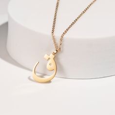 This stunning necklace features a beautifully crafted pendant with a personalized Arabic letter. The elegant design of the letter captures its unique and intricate beauty, making it a focal point of sophistication and charm. The pendant hangs from a delicate chain, perfect for adding a touch of elegance to any outfit. Ideal for everyday wear or special occasions, this necklace makes a meaningful and stylish statement. It also serves as a thoughtful and personalized gift for loved ones, celebrati Personalized Pendant Name Necklace, Elegant Name Necklace With Adjustable Chain, Elegant Metal Name Necklace With Adjustable Chain, Metal Name Necklace With Clavicle Chain For Gifts, Metal Clavicle Chain Name Necklace As A Gift, Personalized Gift Metal Necklace With Adjustable Chain, Elegant Engraved Chain Necklace Gift, Elegant Metal Necklaces For Personalized Gifts, Metal Charm Necklace As A Gift