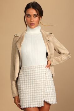 When your style is this on-point, your reputation precedes you! The Lulus Preppy Reputation Ivory Plaid Tweed Faux-Wrap Mini Skirt has a textured woven tweed composition (with a plaid pattern throughout) that shapes a high-waisted fit and an overlapped design that lends a faux-wrap effect. Raw edges throughout. Hidden back zipper/clasp. Fit: This garment fits true to size. Length: Mid-thigh. Size medium measures 15.5" from waist to hem. Waist: Fitted - very fitted at natural waist. Hip: Not Fitted - room for hips. Fabric: Fabric has no stretch. Fully lined. Shell: 100% Polyester. Lining: 100% Polyester. Hand Wash Cold. Do Not Bleach. Hang To Dry. Imported. Lulus | Preppy Reputation Ivory Plaid Tweed Faux-Wrap Mini Skirt | Size Medium | 100% Polyester. Tweed Skirt Outfit, Fall Work Outfits, Plaid Wrap Skirt, Casual Outfit Inspiration, Effortlessly Chic Outfits, Wrap Mini Skirt, Lulu Fashion, Tweed Mini Skirt, Miniskirt Outfits