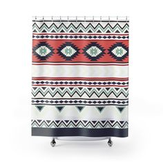 a shower curtain with an ethnic pattern on it