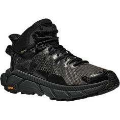 HOKA's newest hiking boot, the Trail Code GTX helps us tread more lightly on the trail and on the planet with its lightweight build and extensive use of recycled materials. The Trail Code is max cushioned like other HOKA hiking boots while having a more sneaker-like build than the Anacapa and using a new foam that's both responsive and super-cushy to both hold up to hiking and keep our hiking feet content. Weighing less than two pounds per pair, this light hiker doesn't slow us down, but it's Rugged Sports Hiking Boots, Mid-top Trail Running Shoes With Vibram Sole, Rugged Impact-resistant Hiking Boots For Sports, Rugged Impact Resistant Hiking Boots For Sports, Impact Resistant Rugged Hiking Boots For Sports, Dynamic Impact-resistant Trail Running Shoes For Outdoor, Rugged Gore-tex Trail Running Shoes With Impact Resistance, Functional Waterproof Boots With Boost Midsole For Walking, Functional Impact Resistant Sneakers For Hiking