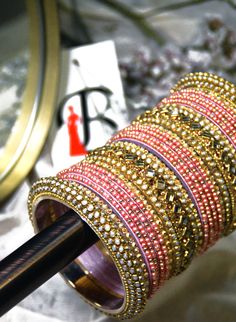 Gold & Pink Bridal Chooda Bangles in the USA Bohemian Beaded Bangle Bracelet For Wedding, Gold Beaded Bangle For Wedding, Adjustable Temple Jewelry Bangle For Wedding, Traditional Beaded Bangle For Wedding, Festive Pink Cutdana Bracelets, Beaded Bangle For Wedding And Festive Occasions, Traditional Wedding Beaded Bangle, Festive Bohemian Bracelet For Weddings, Festive Beaded Wedding Bangle