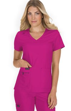 Our amazingly affordable koi Basics Becca top.
* Classic v-neck
* Contrast print facing at neck
* Bungee loop for ID badge
* Lightweight moisture-wicking fabric
* Four pockets including hidden cell phone pocket with print lining
Fabric
95% polyester 5% Spandex microfiber stretch Contrast print: 100% cotton lawn Koi Scrubs, Extra Petite, Pink Galaxy, Grey And Coral, White Charcoal, Blue White And Black, Coral Blue, Id Badge, Scrub Tops