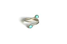 Reveal your inner bohemian goddess with this stunning sterling silver genuine turquoise stacking ring ▲ .925 sterling silver ▲ Genuine 4mm turquoise stones ▲ Available in sizes 1-10 ▲ If you intend to wear this as a midi ring the recommended size is three sizes below your normal ring size, the average midi ring size is 3 1/2 :) Please visit www.childrenofflowers.com for even more designs! Please copy and paste this link for an international ring size conversion chart-http://www.tradeshop.com/mas Bohemian Adjustable Stackable Turquoise Ring, Adjustable Stackable Bohemian Turquoise Ring, Adjustable Sterling Silver Turquoise Spiritual Ring, Adjustable Sterling Silver Spiritual Turquoise Ring, Elegant Adjustable Stackable Rings, Nickel Free, Bohemian Nickel-free Toe Midi Rings, Bohemian Midi Rings Nickel Free, Elegant Adjustable Nickel Free Stackable Rings, Elegant Adjustable Nickel-free Stackable Rings